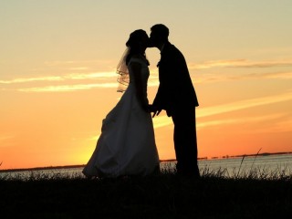 Wedding Kiss At Sunset